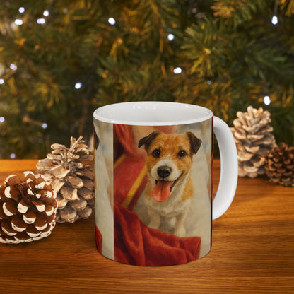 Mug with a dog design on a wooden surface with pine cones and a Christmas tree in the background
